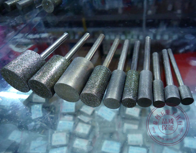 Diamond cylindrical grinding head peeling and polishing