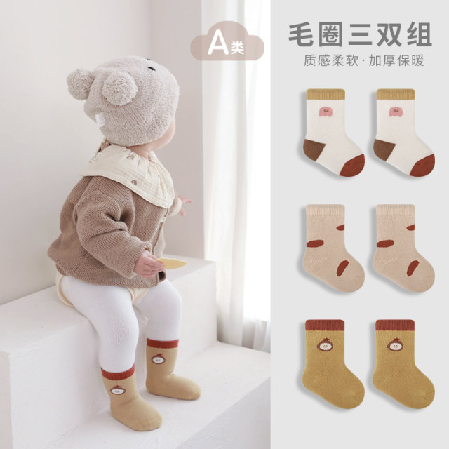 ການເກັບຮັກສາຄວາມຮ້ອນ Terry ກາງ calf socks ກາຕູນລະດູຫນາວງາມ