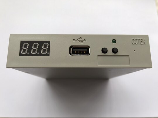 Enhanced version of electronic keyboard emulation supports partitioned floppy drive