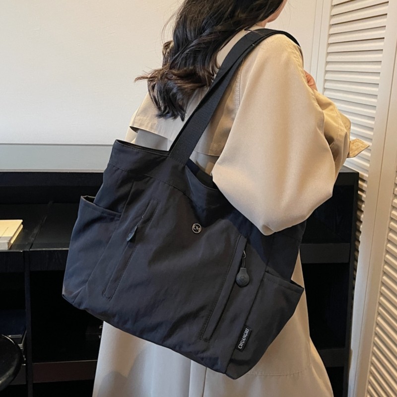 韩版帆布托特包包女2025新款大容量手提通勤包简约百搭休闲单肩包,淘宝优惠券,粉丝福利购,淘宝优惠卷