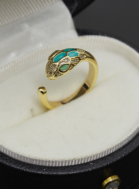 钛钢时尚绿眼睛蛇形戒指