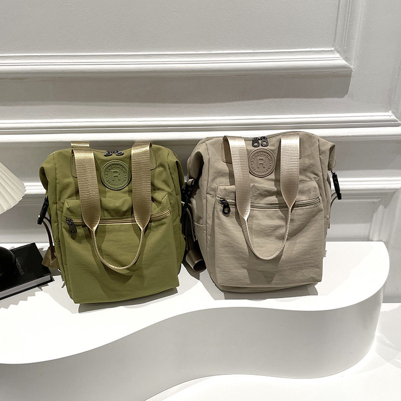 韩版防水多功能双肩包2025情侣款尼龙布时尚运动背包大容量女书包,淘宝优惠券,粉丝福利购,淘宝优惠卷