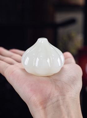 石诚记天然玉石胜算在握手把玩