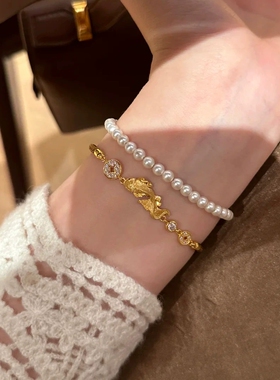 灵动棕绳拉丝锦鲤金钱编织手链