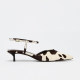 Lu Yanlin black and white cow pattern toe sandals women's stiletto fashion buckle strap kitten heel hollow back high heels