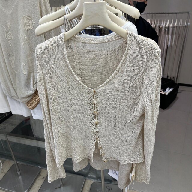 ເສື້ອຍືດຄໍ V-neck ຝຣັ່ງ knitted hollow cardigan ສໍາລັບແມ່ຍິງ