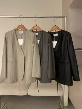 ແບບຈີນໃຫມ່ collarless ສີດໍາກະທັດຮັດ versatile suit jacket ຫນັງ PU 2024 ພາກຮຽນ spring ວ່າງ temperament jacket ບາດເຈັບແລະສໍາລັບແມ່ຍິງ