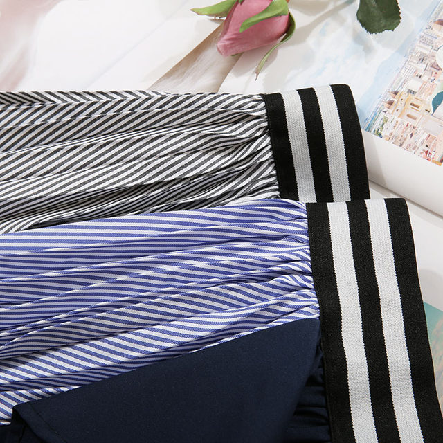 Autumn and winter new versatile contrasting color splicing high-waisted striped ruffled irregular pleated mid-length skirt