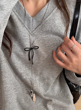 芭蕾风蝴蝶结鞋子吊坠项链女钛钢不掉色抽拉式长款毛衣链挂脖配饰