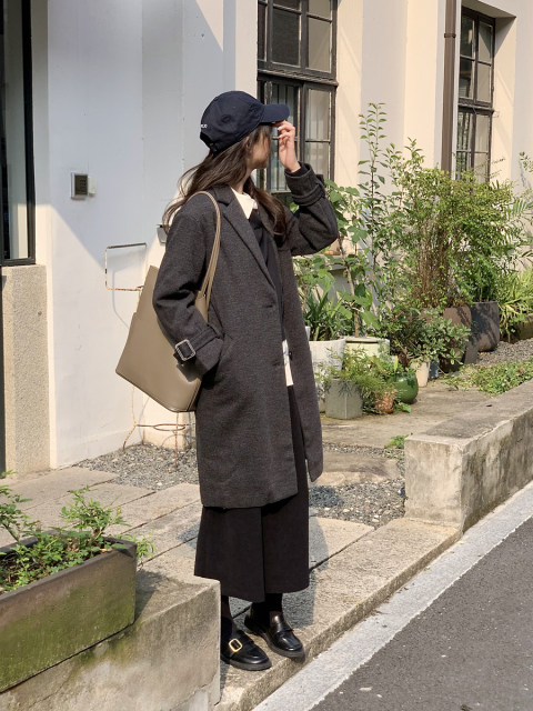 This is a mid-length woolen jacket