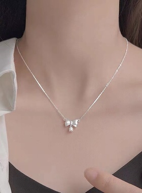 s925银蝴蝶结风铃项链女小众设计颈链2024新款爆款轻奢锁骨链