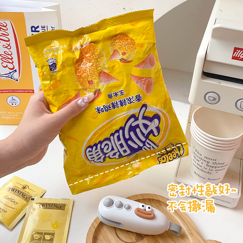 便携封口机家用手压式密封迷你小型食品袋封口神器裁切零食包装袋 - 图1
