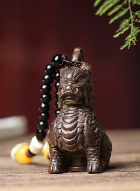 沉香木麒麟手把件瑞兽