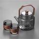 ເຕົາໄຟຟ້າ borosilicate ສູງ ເຕົາເຊລາມິກໃຫ້ຄວາມຮ້ອນເຄື່ອງເຮັດຊາໃນຄົວເຮືອນງ່າຍດາຍເຕົາຊາ - ຫມໍ້ຫຸງຕົ້ມຊາຊຸດກະເປົ໋າ