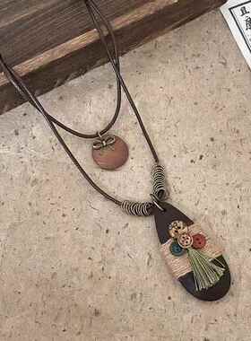新中式纽扣蝴蝶结吊坠项链女复古长款毛衣链古风禅意百搭锁骨链潮