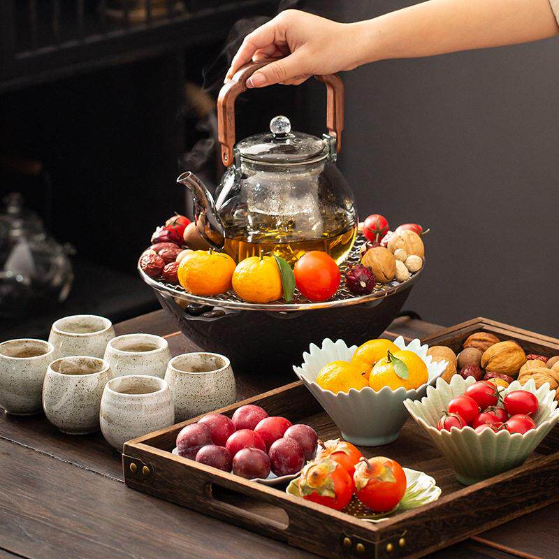 Cooking tea around the stove, household living room tea stove, health-preserving teapot, tea set, black crystal stove, tea set, special
