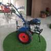 Foreign trade export micro tiller 170 gasoline two-wheel drive rotary tiller multi-functional ditching and weeding machine