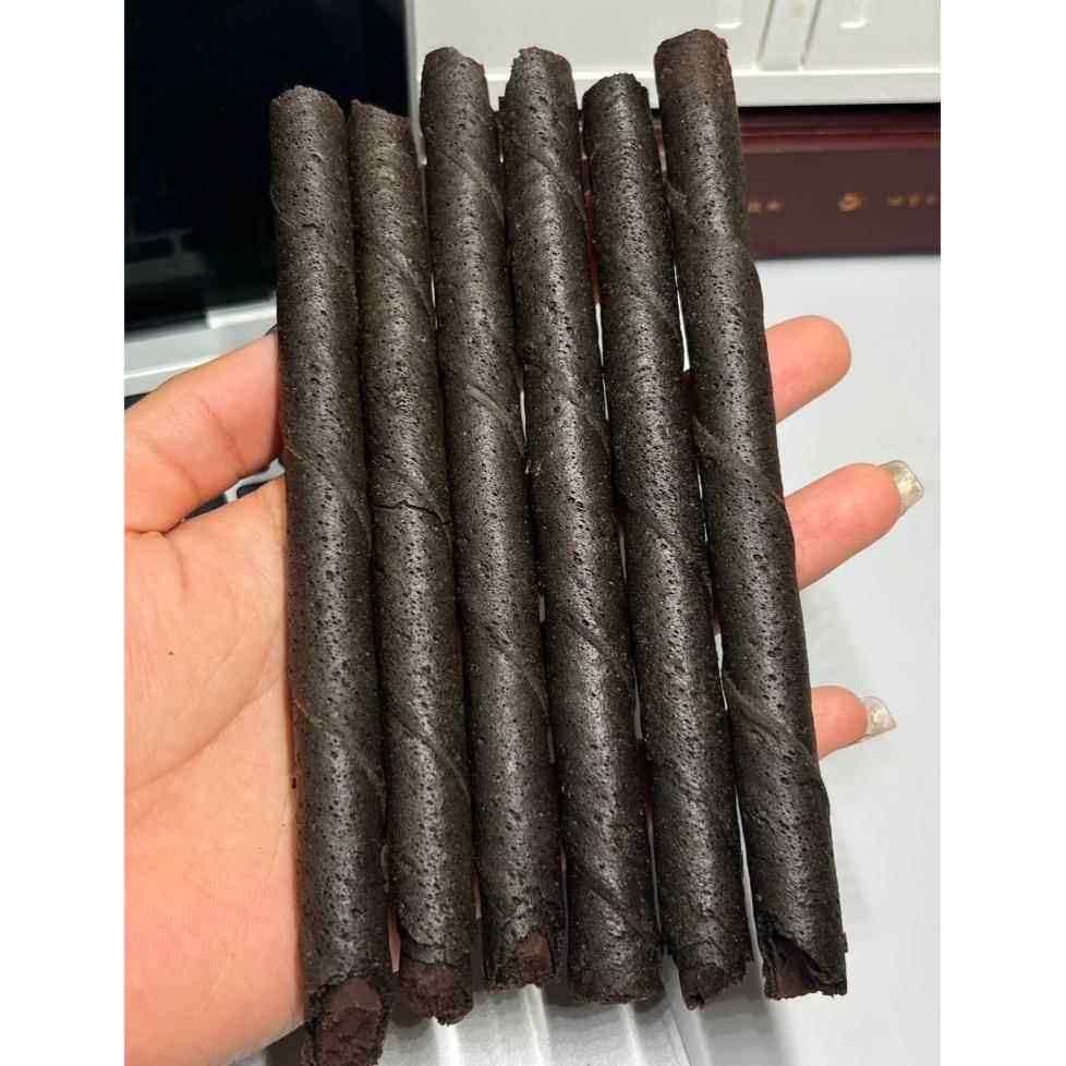 印度尼西亚进口 DEKA黑巧克力味夹心卷饼干140g咖罗密,淘宝优惠券,粉丝福利购,淘宝优惠卷