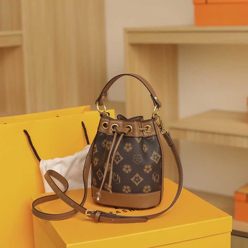 网红款迷你小水桶包2025新款女包时尚百搭手提老花包单肩斜挎小包,淘宝优惠券,粉丝福利购,淘宝优惠卷