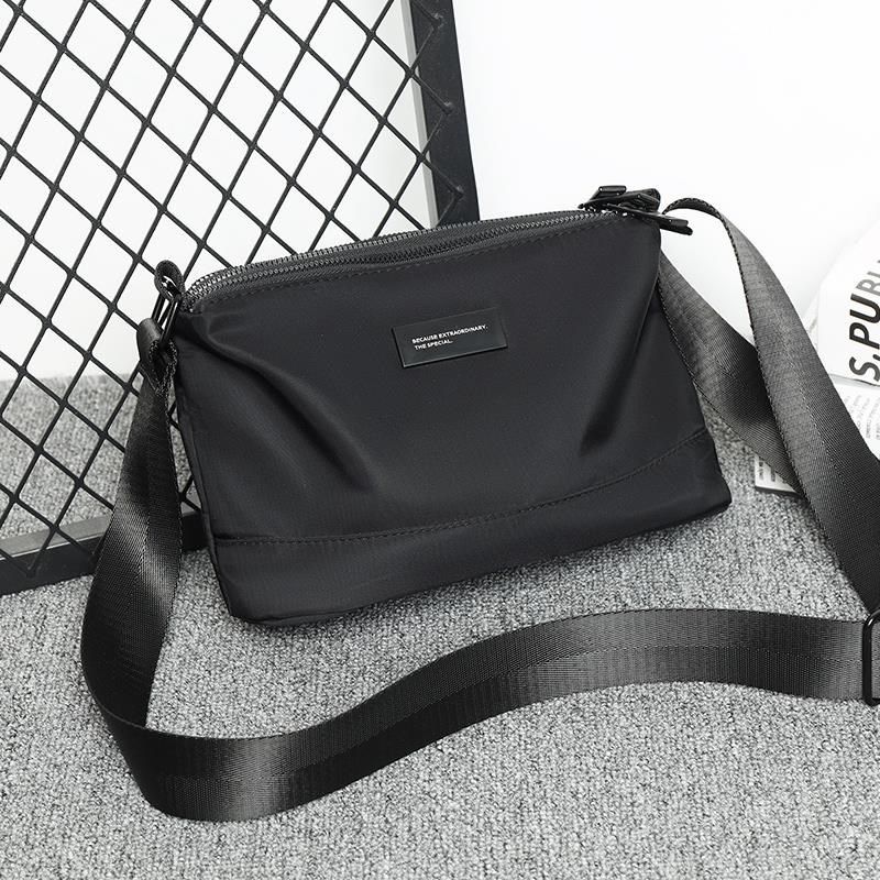 2024年新款男士包包单肩斜挎包时尚外出便携防水牛津布背包挂包,淘宝优惠券,粉丝福利购,淘宝优惠卷