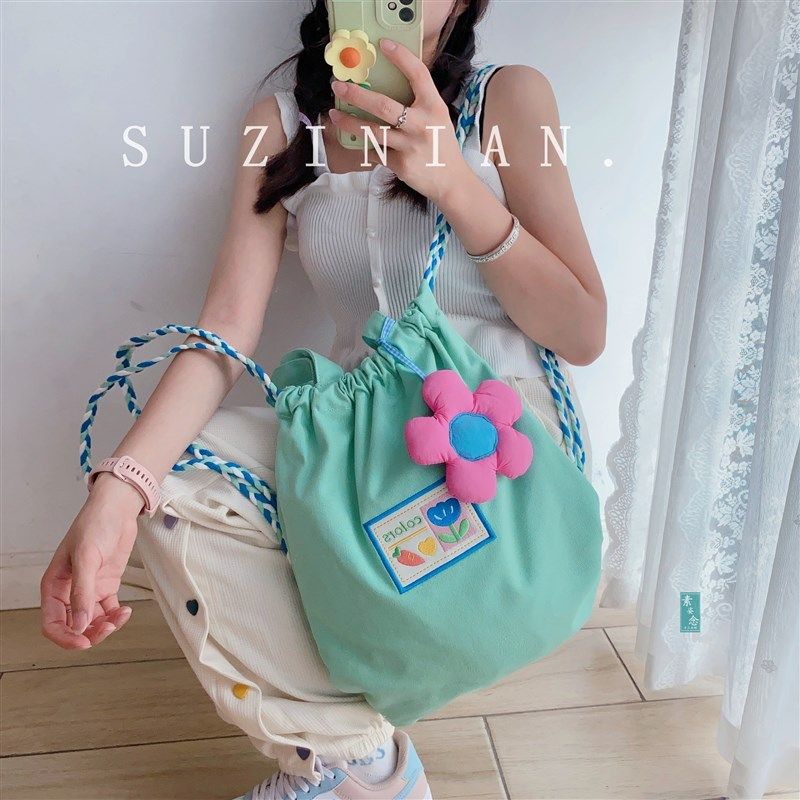 小众设计可爱束口抽绳帆布单肩包女大学生补习大容量手提双肩书包,淘宝优惠券,粉丝福利购,淘宝优惠卷