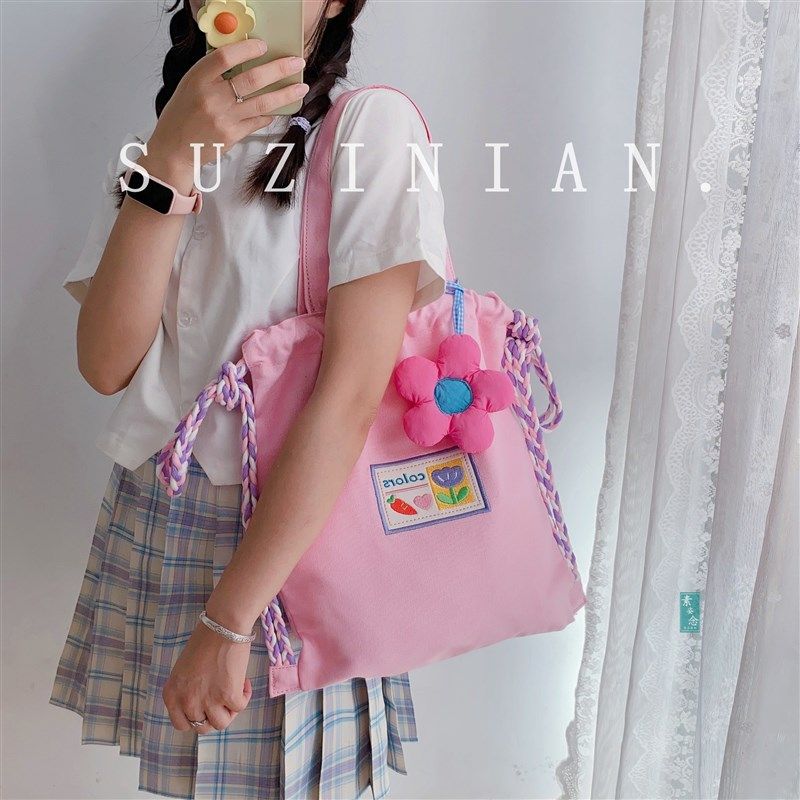 小众设计可爱束口抽绳帆布单肩包女大学生补习大容量手提双肩书包,淘宝优惠券,粉丝福利购,淘宝优惠卷