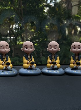 2024新款比亚迪海豚太阳能一禅摇头小和尚敲木鱼汽车内摆件装饰品