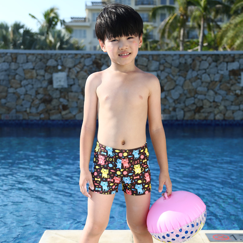 small boy swimming