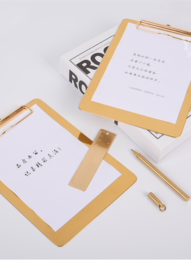 不锈钢金色写字板摆拍