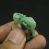 Burmese natural waxy green Pixiu ring and jade