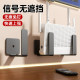 Router placement rack without punching holes for wall hanging