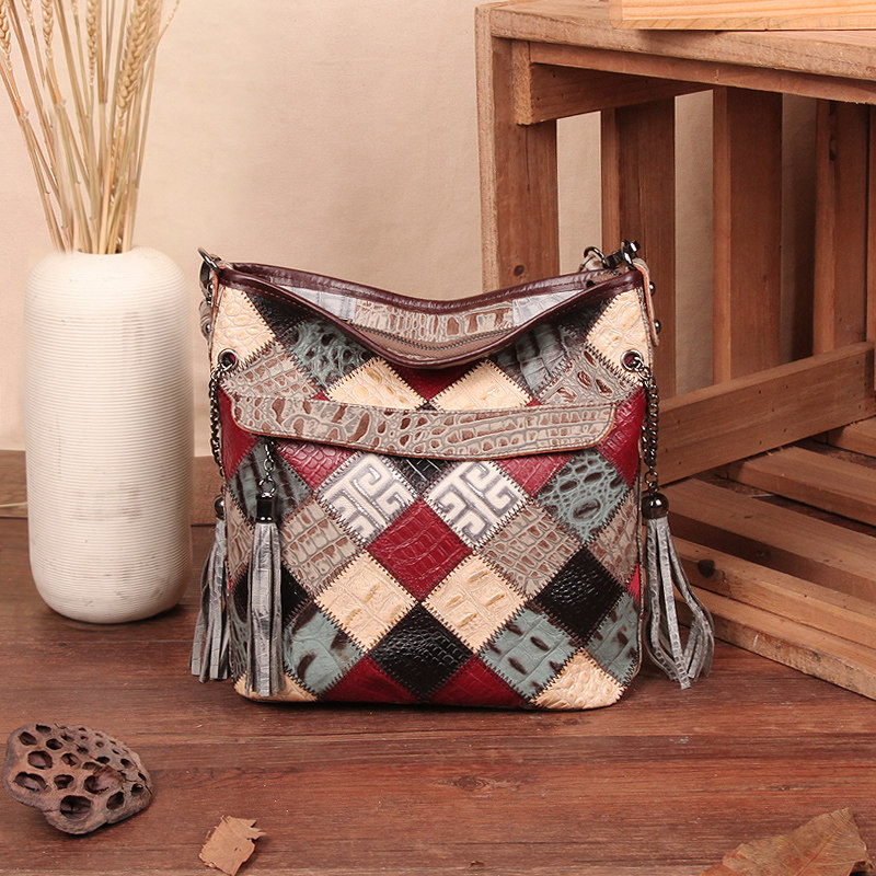 2024新款单肩斜挎包包小众设计真皮女士流苏百搭原创秋冬水桶女包,淘宝优惠券,粉丝福利购,淘宝优惠卷