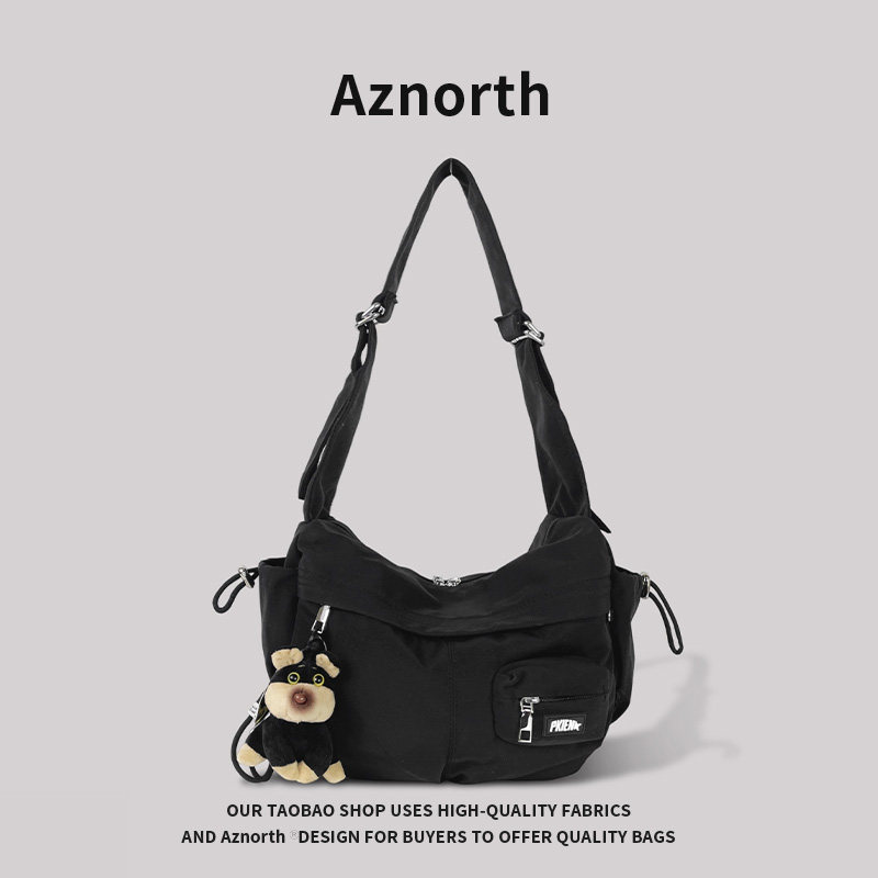 AZN新品 斜挎包女2026新款休闲饺子包男潮牌运动轻便单肩背包1.16
