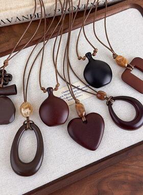 新中式复古长款不规则镂空木质吊坠项链时尚小众设计高级感毛衣链