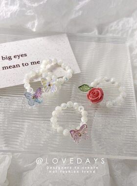 个性设计弹力玫瑰花戒指猫眼石花朵炫彩蝴蝶戒指温柔串珠叠戴指环