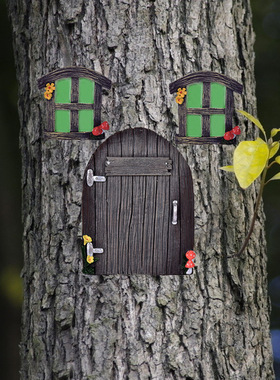 厂家创意批发现货新款花园树上门窗挂件树脸挂件树脂工艺品摆件