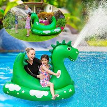 Dinosaur sits on a floating swimming ring outdoor play water toy children play water spray water spray mat beach lawn inflatable sprinkler