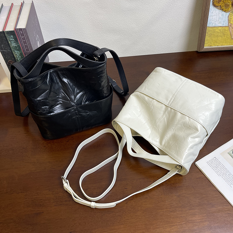 MrFu头层牛皮水桶包女2025新款真皮手提包大容量单肩斜挎包通勤包 - 图0