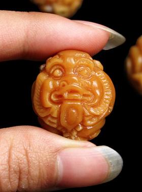 黄色风化菩提根原籽手把件文玩