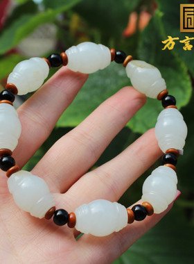 新疆留皮孔白玉籽料13mm鼓珠手串