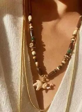 春夏新款棕色串珠搭配橘粉色立体小象项链小众设计高级感锁骨链女