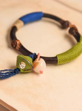 芜然蕙草暮，飒尔凉风吹。小众鸡血藤手镯印尼琉璃彩色编织绿色系