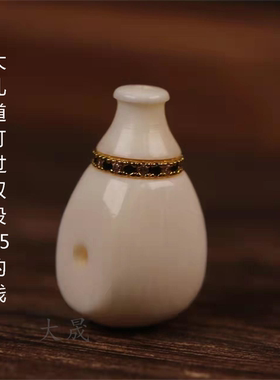 大晟猛犸象牙三通佛头文玩