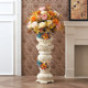 Roman column floor-standing vase ceramic next to TV cabinet in living room