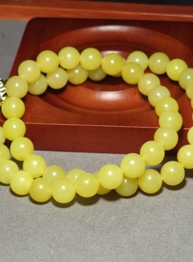 L032306 新疆的猫77.1克直径10mm色调油亮颜色纯正若羌鸡油黄项链