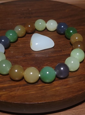 新疆的猫YQ081903 29.5克，直径10mm色泽搭配绚丽全家福圆珠手链