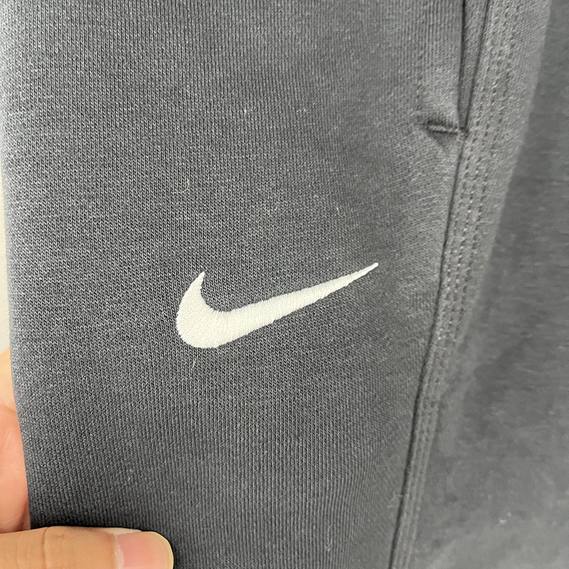 Nike/耐克男子秋冬加绒加厚针织宽松直筒运动保暖休闲长裤 623455