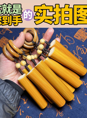 远山工万目精抛实心玉竹手把件