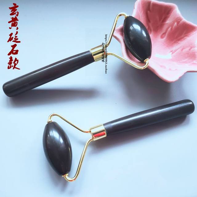 A pair of agate massage sticks, natural jade beauty roller type facial and eye massager, manual lifting