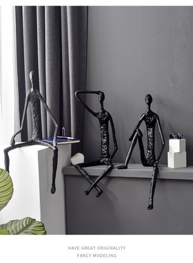 抽象铸铁黑人雕塑吊脚坐姿